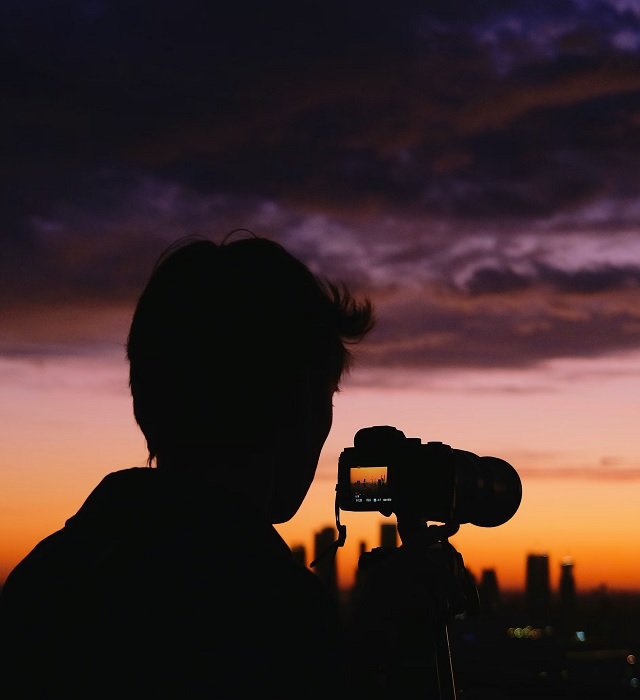Photographer shooting at dusk