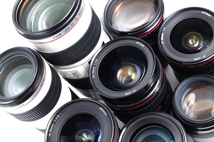 8 different camera lenses with variable aperture