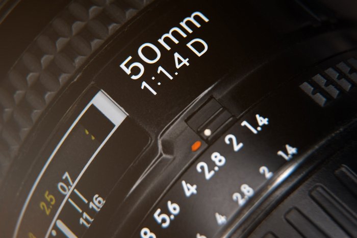 an closeup image of a 50mm camera lens focus ring