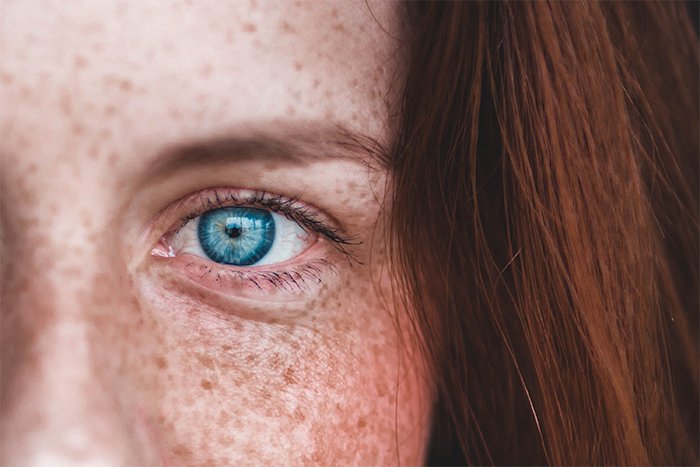 Close up image of a girl's eye with a very shallow depth of field