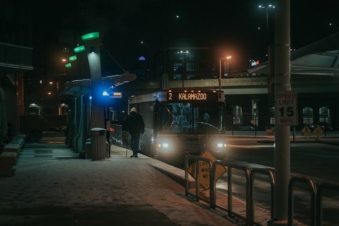 low light photography example: multiple lights illuminate a bus stop in kalamazoo 