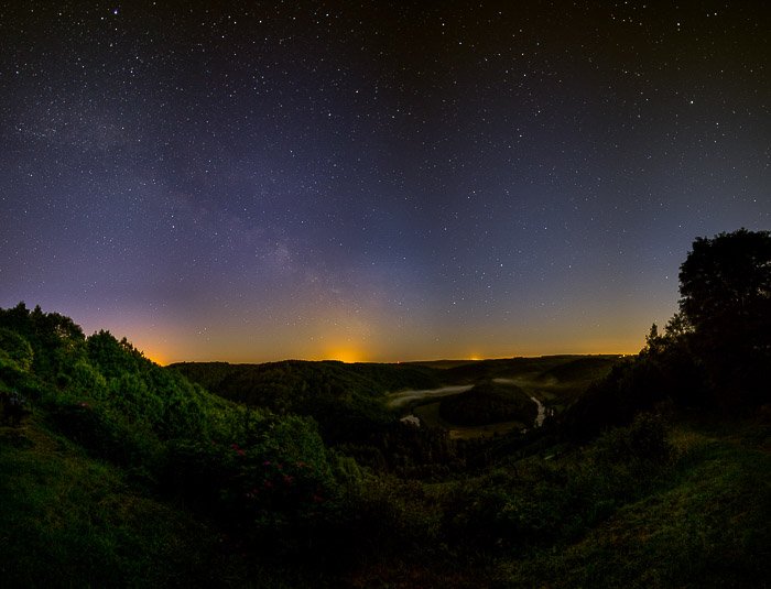 A stunning nightsky photo using the full moon to light the image