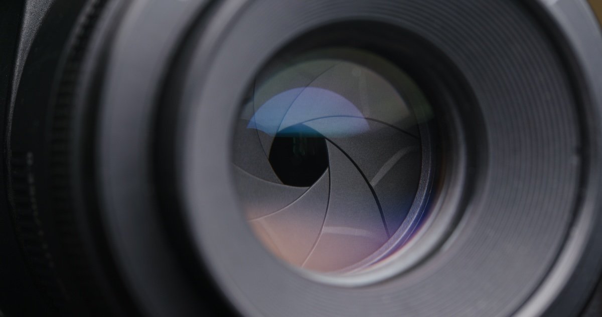 Close-up of a camera lens aperture blades