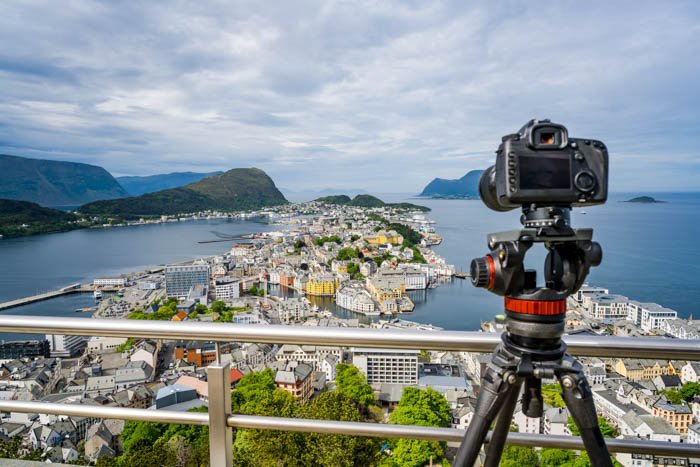 Cityscape travel photography with a camera on a tripod in the city of Alesund, Norway.