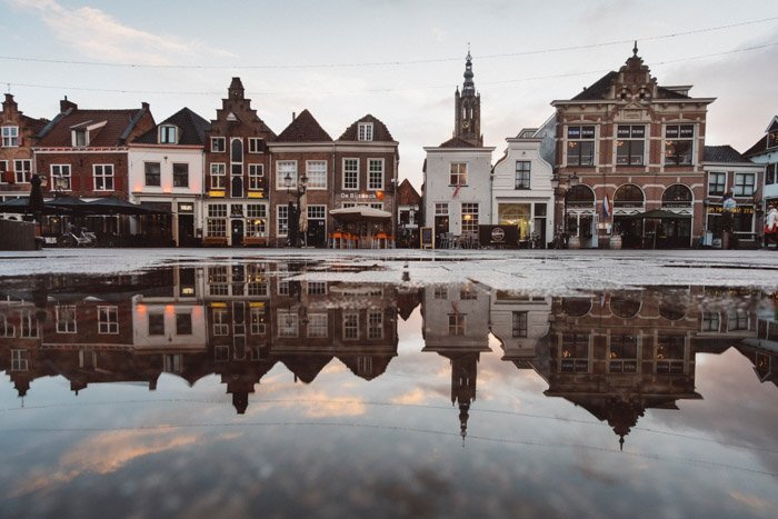 A great travel photograph with reflections and composition of a village