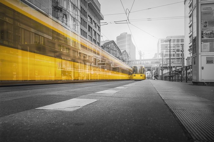 A yellow tram with motion blur 