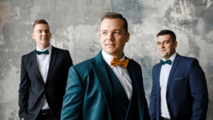 groomsmen photo idea: Three guys in suits